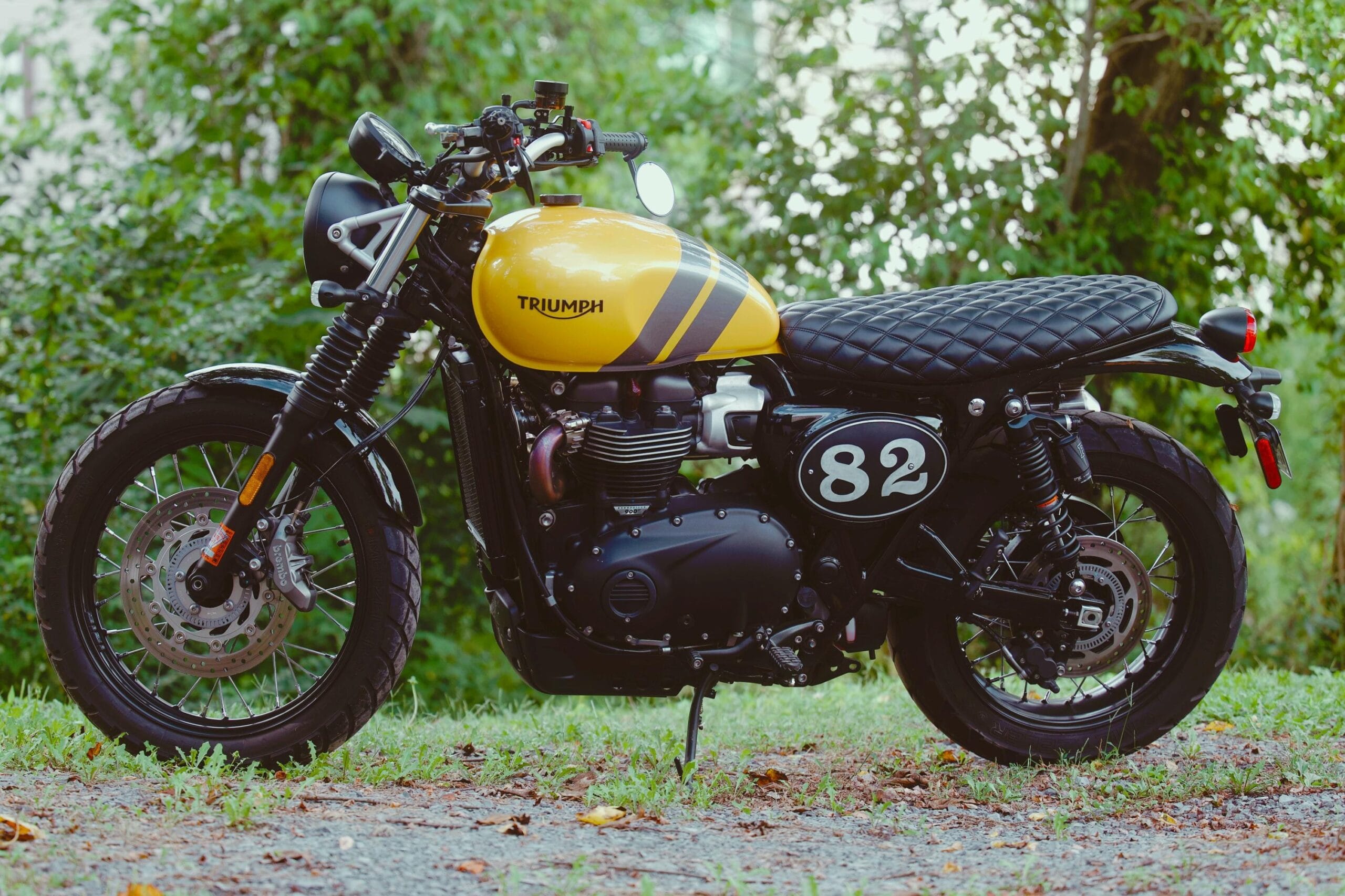 Triumph Street Scrambler photographed in workshop light